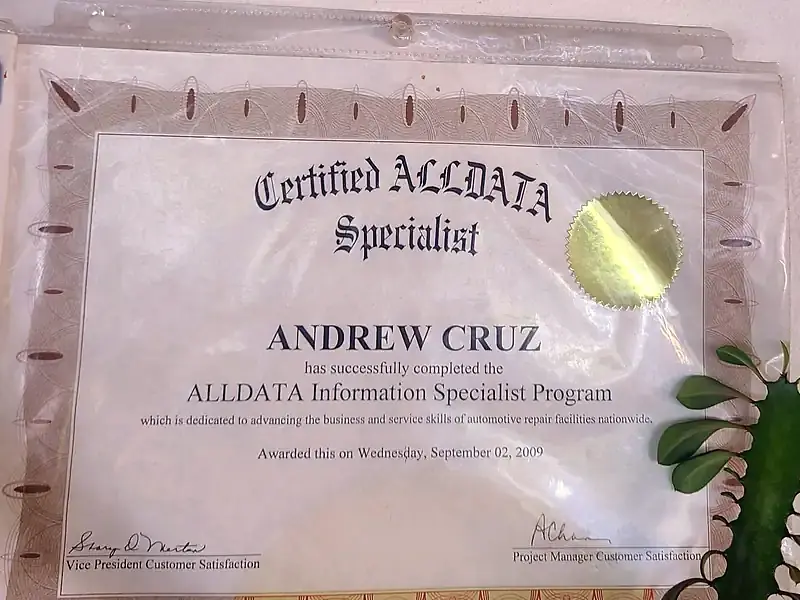 Certified ALLDATA Specialist certificate awarded to Andrew Cruz on September 2, 2009, for completing the ALLDATA Information Specialist Program