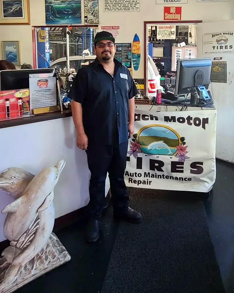 Andrew Cruz of Beach Motor & Tires standing at the front counter